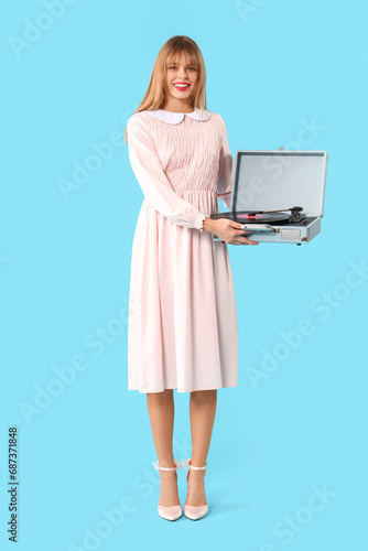 Young woman dressed as doll...