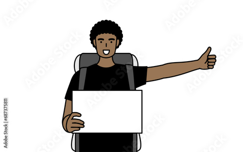 African-American man hitchhiking with a smile