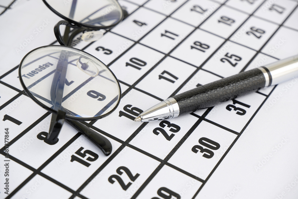 Calendar with pen and eyeglasses. Calendar with pen and eyeglasses.