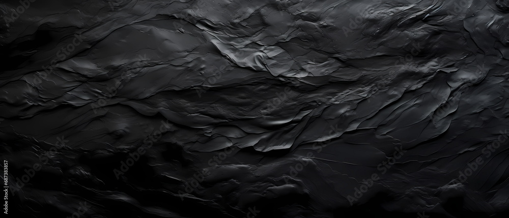 Black abstract background. Texture of black acrylic paint on a black canvas. Black abstract background. Texture of black acrylic paint on a black canvas.