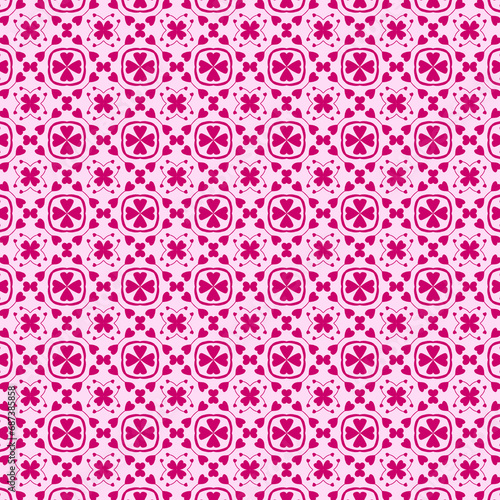 A shocking pink floral seamless pattern on a light pink background