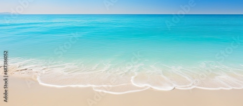 Stunning Saadiyat island beach with crystal-clear turquoise water. photo