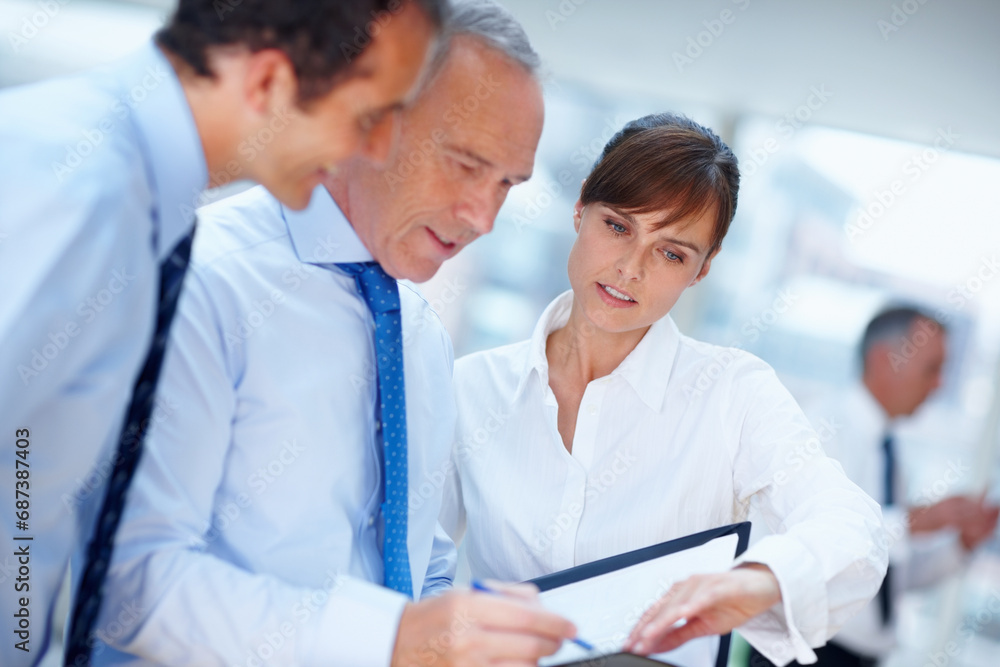 Fototapeta premium Business people, meeting and documents with conversation, mentor and planning with support, coaching and partnership. Help, manager or employees with paperwork, team or corporate training with advice