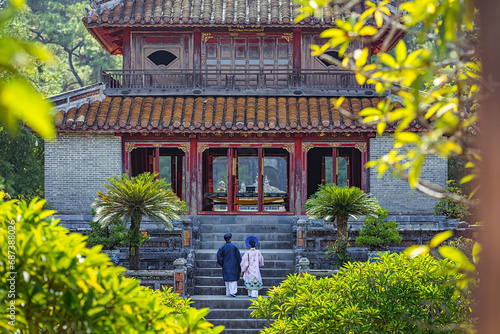 Canvas Print Tourists wear ancient costumes in the tomb of King Minh Mang, Thua Thien Hue, Vi