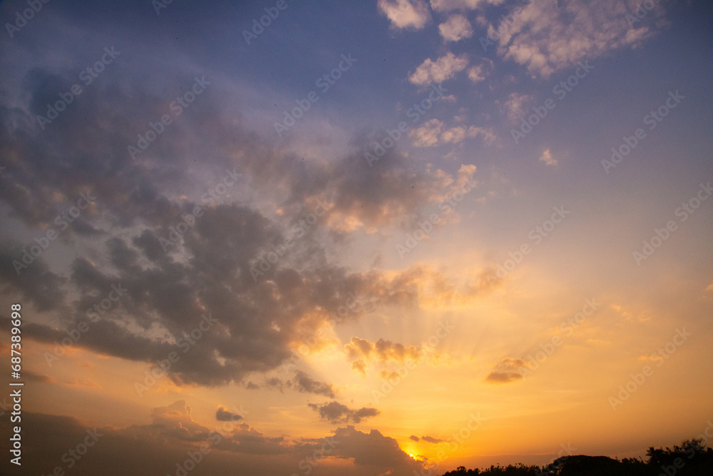 full sky with blue color along with clouds, Full sky in yellow color with rising of sun, Combination of blue and yellow sky