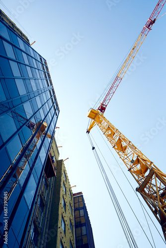 A construction crane is erecting a building