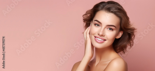 Portrait of young happy woman. Skin care beauty, skincare cosmetics, dental concept. Isolated over pink background.