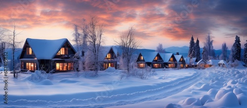 Twilight winter cabins in Furano, Hokkaido, Japan. photo