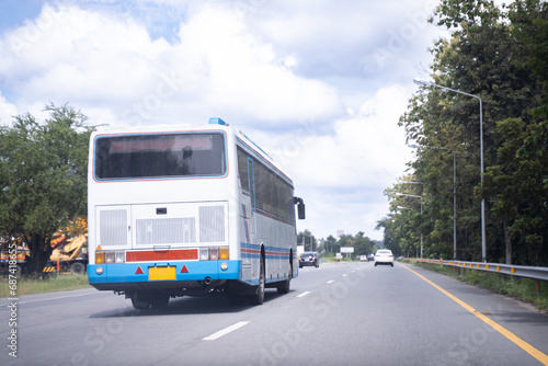 tourist bus ,Comfortable public bus driving through the clear sky highway. Travel, tourism concept