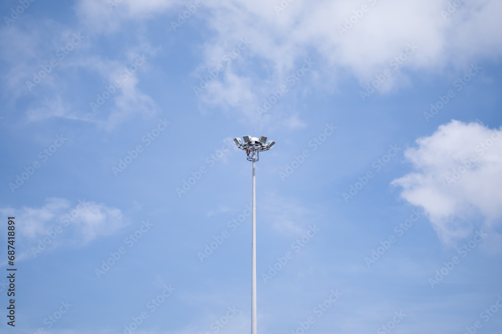 Electrical poles, sports line poles On the background of the bright sky Electrical poles, sports line poles On the background of the bright sky