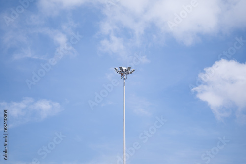 Electrical poles, sports line poles On the background of the bright sky