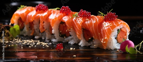 Close-up of delicious salmon sushi roll, highlighting fresh and tasty ingredients.