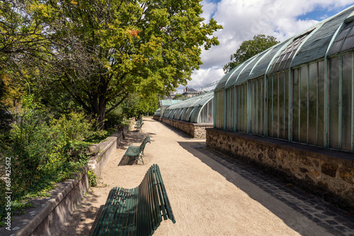 Old Greenhouses at the Jardin des Serres d'Auteuil in summer. This botanical gaden is a public park located in Paris, France photo