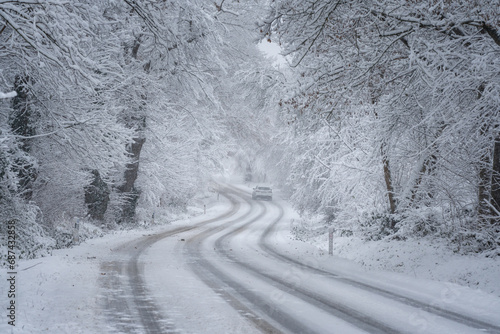 Winter snow-covered roads. Winter forest road. 