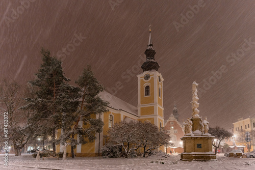 The town of Hodonín in the middle of winter. Advent time in Hodonín. Snow-covered square.