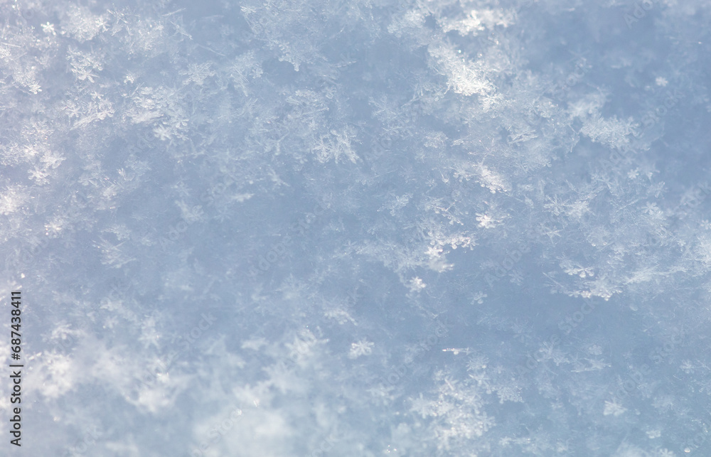 White snowflakes in winter as an abstract background. Texture