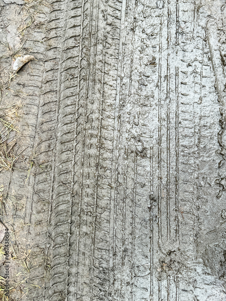 Obraz premium A wheel mark in the dirt. Background