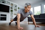 middle aged Asian man engaging in a push up exercise in his contemporary living room