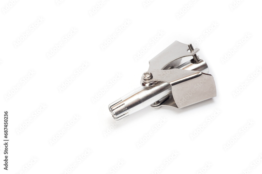 Mechanical trimmer for removing nose hair, made of light metal. Mechanical trimmer for removing nose hair, made of light metal.