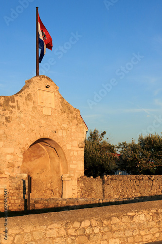 sundown on an ancient gate in Nin, Croatia