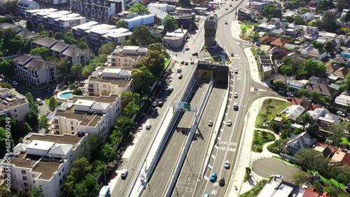 Sydney city CBD aerial flying over rozelle interchange on WestConnex as 4k.
 photo