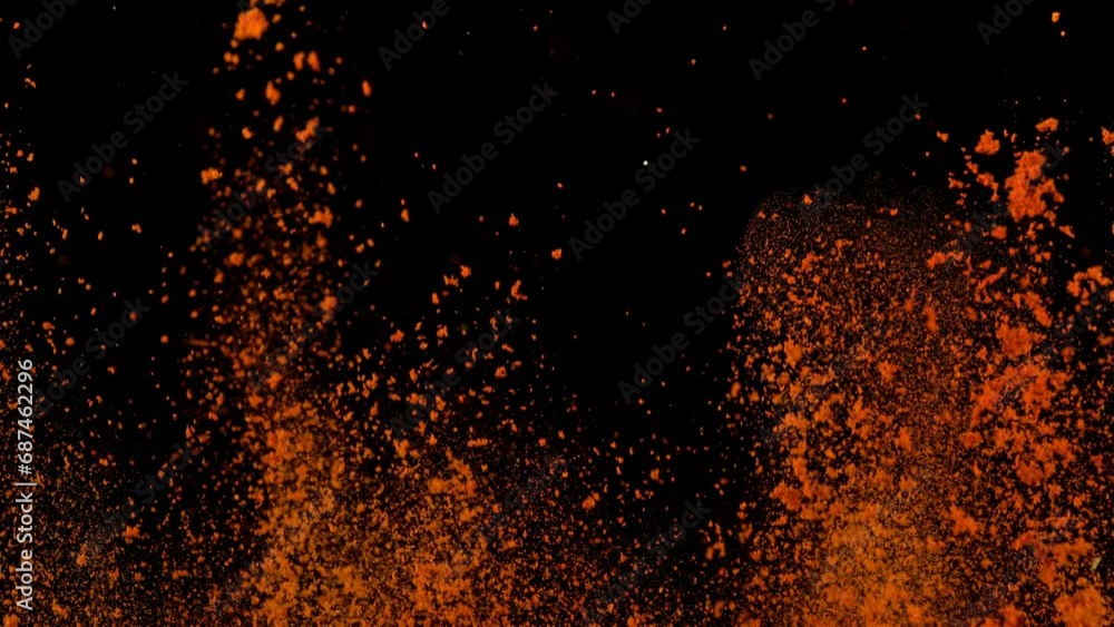 Super Slow Motion Shot of Dried Red Pepper Powder Explosion Isolated on Black Background at 1000fps. Super Slow Motion Shot of Dried Red Pepper Powder Explosion Isolated on Black Background at 1000fps.