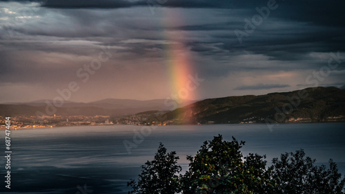 Enchanting Rainbow Across Trondheim's Scenic Fjord photo