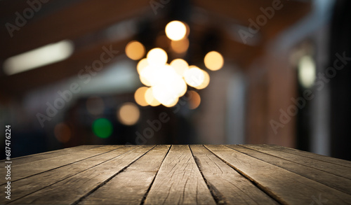 Perspective wooden table and bokeh light background. product display template