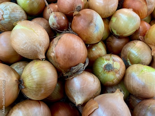 heap of onions on the market