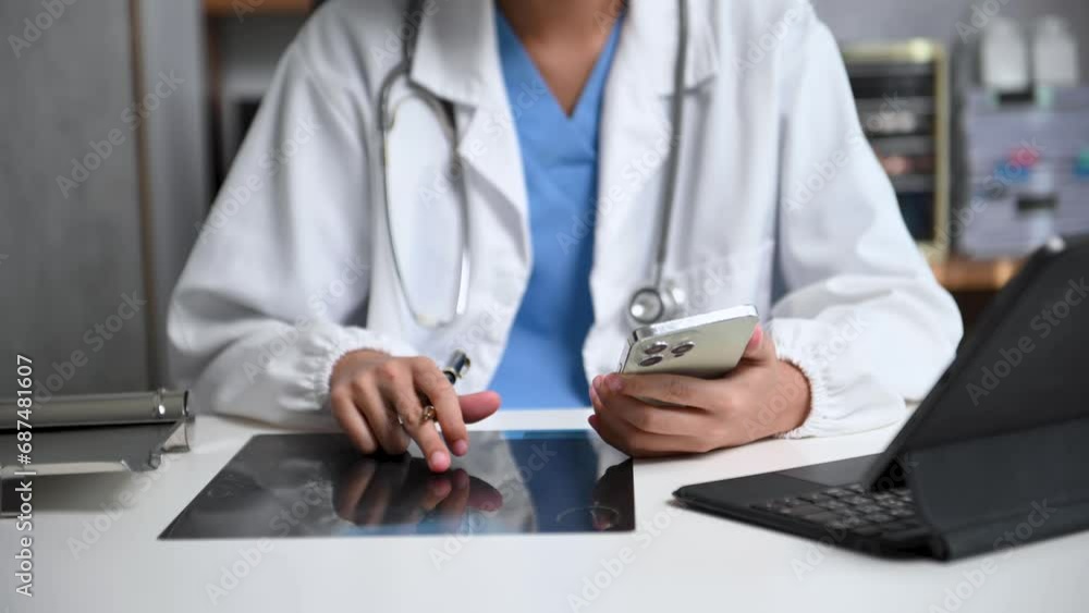 Medical technology concept. Doctor working with mobile phone and stethoscope and digital tablet laptop in modern office at hospital . Medical technology concept. Doctor working with mobile phone and stethoscope and digital tablet laptop in modern office at hospital .