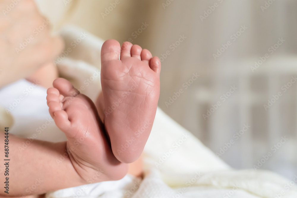Newborn baby's heels close up. Selective focus, close-up Newborn baby's heels close up. Selective focus, close-up