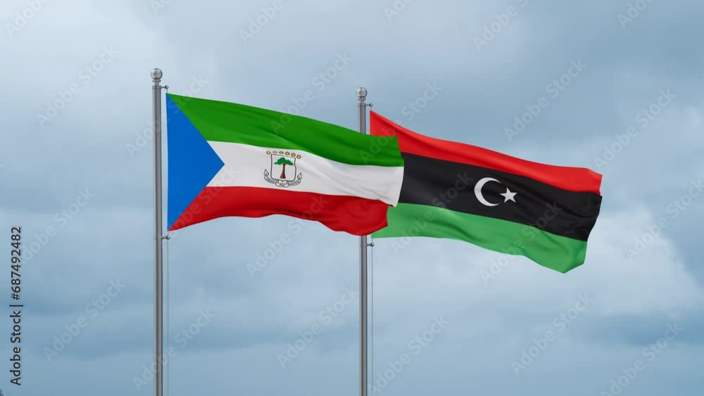 Libya and Equatorial Guinea flag waving together on cloudy sky, endless seamless loop, two country cooperation concept Libya and Equatorial Guinea flag waving together on cloudy sky, endless seamless loop, two country cooperation concept
