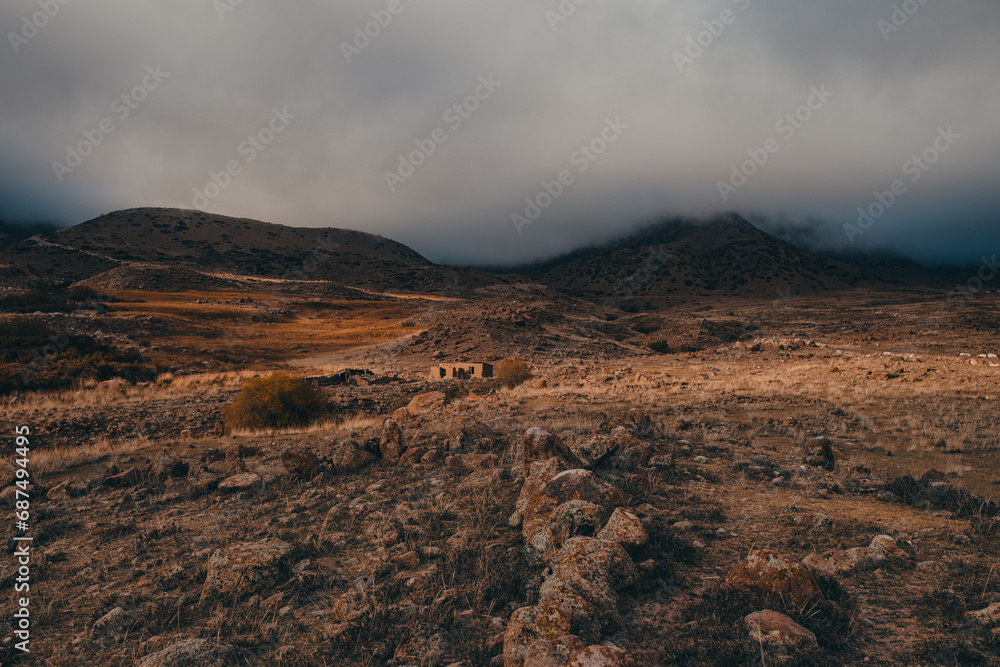 Dramatic mountains rocky landscape in cloudy weather