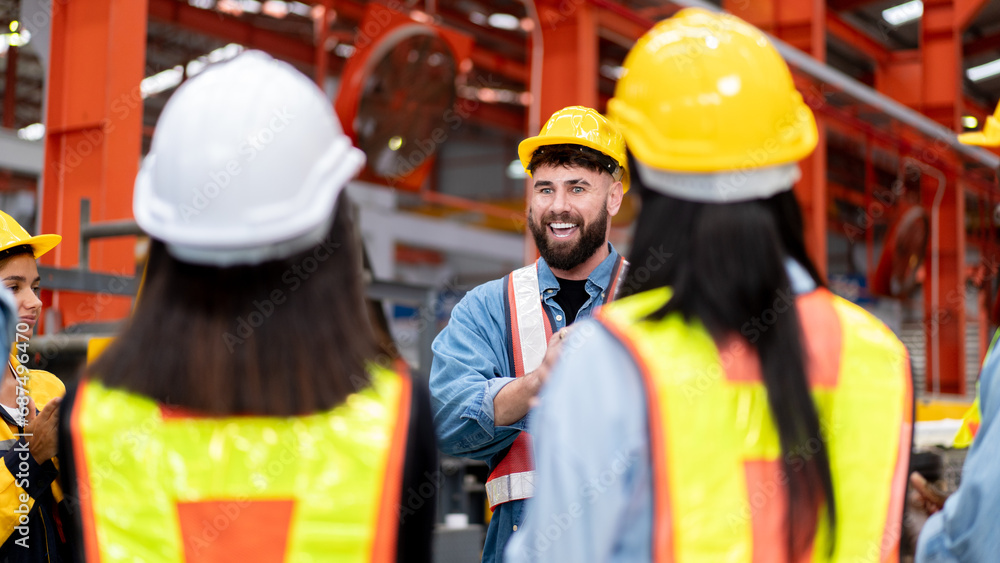 manager cheering up team colleagues in morning meeting before going to work at manufacturing industrial factory, teamwork of diverse worker in safety dress standing casual talking production timeline manager cheering up team colleagues in morning meeting before going to work at manufacturing industrial factory, teamwork of diverse worker in safety dress standing casual talking production timeline