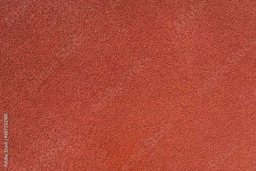 red running tracks textured background, rubber coating for stadiums,  photo