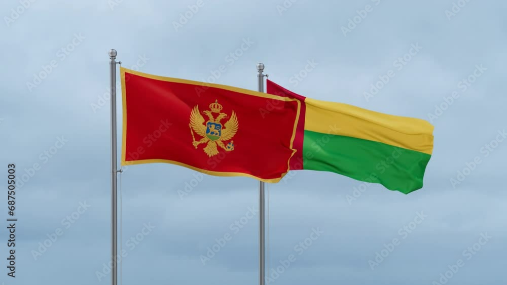 Guinea-Bissau flag and Montenegro flag waving together on cloudy sky, endless seamless loop, two country relations concept Guinea-Bissau flag and Montenegro flag waving together on cloudy sky, endless seamless loop, two country relations concept