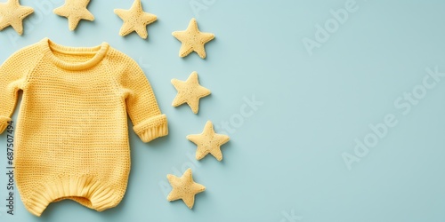Knitted toy yellow stars on blue background. Baby stuff and accessories. Flat lay, top view : Generative AI photo