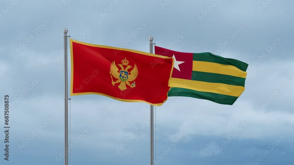 Togo, Togolese Republic and Montenegro flag waving together on cloudy sky, endless seamless loop, two country cooperation concept Togo, Togolese Republic and Montenegro flag waving together on cloudy sky, endless seamless loop, two country cooperation concept