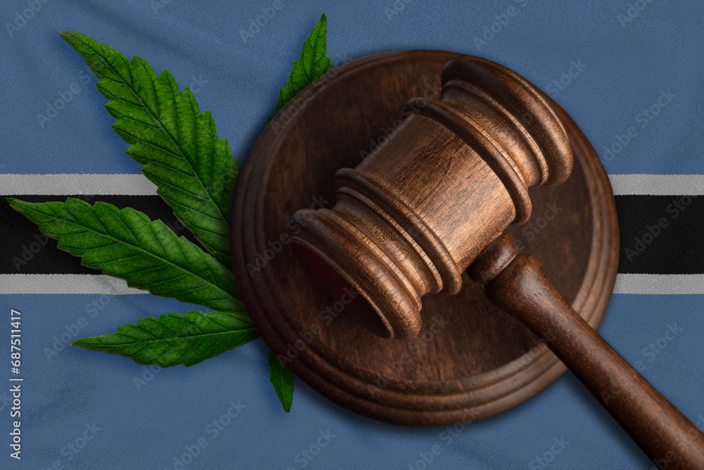 Flag of Botswana and justice gavel with cannabis leaf. Illegal growth of cannabis plant and drugs spreading