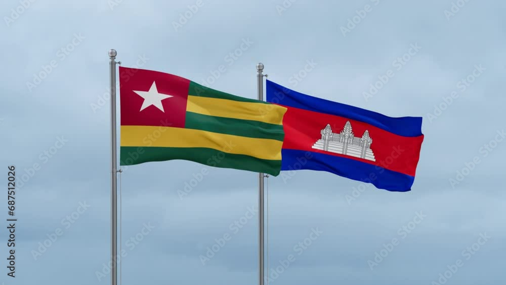 Cambodia flag and Togo flag waving together on cloudy sky, endless seamless loop, two country relations concept Cambodia flag and Togo flag waving together on cloudy sky, endless seamless loop, two country relations concept