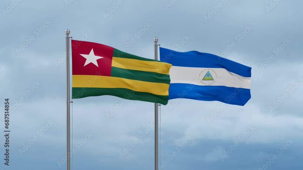 Nicaragua flag and Togo flag waving together on cloudy sky, endless seamless loop, two country relations concept Nicaragua flag and Togo flag waving together on cloudy sky, endless seamless loop, two country relations concept