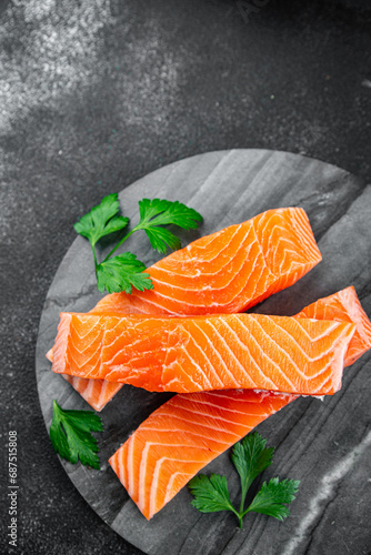 raw salmon pieces fresh delicious red fish healthy eating cooking appetizer meal food snack on the table copy space food background rustic top view keto or paleo diet pescetarian