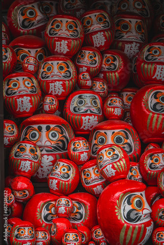 Japanese red daruma traditional doll background wallpaper © Pongsapak