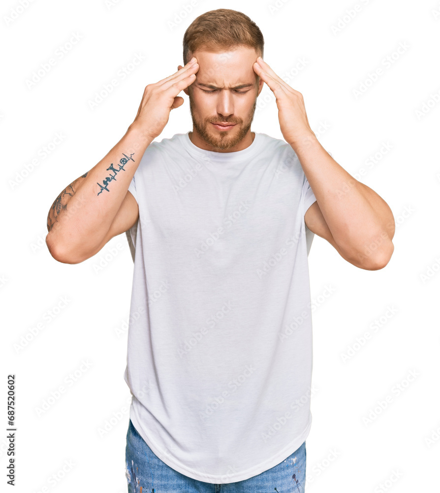 Fototapeta premium Young irish man wearing casual clothes with hand on head for pain in head because stress. suffering migraine.