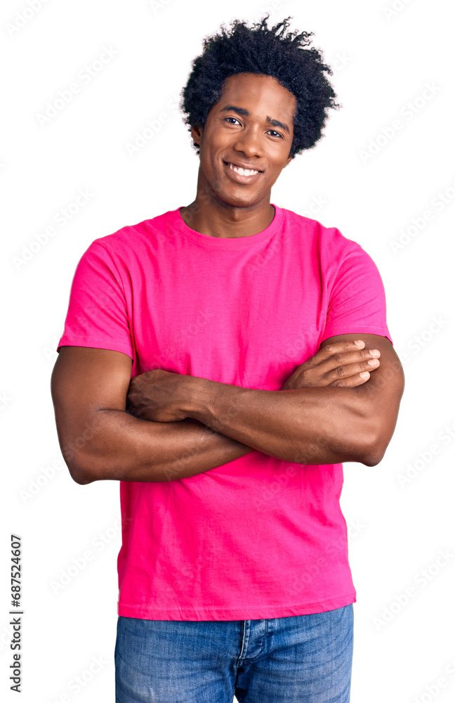 Handsome african american man with afro hair wearing casual pink tshirt happy face smiling with crossed arms looking at the camera. positive person. Handsome african american man with afro hair wearing casual pink tshirt happy face smiling with crossed arms looking at the camera. positive person.