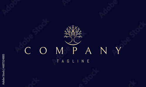 A vector golden logo with an abstract image of a girl in the lotus position in the form of a tree.