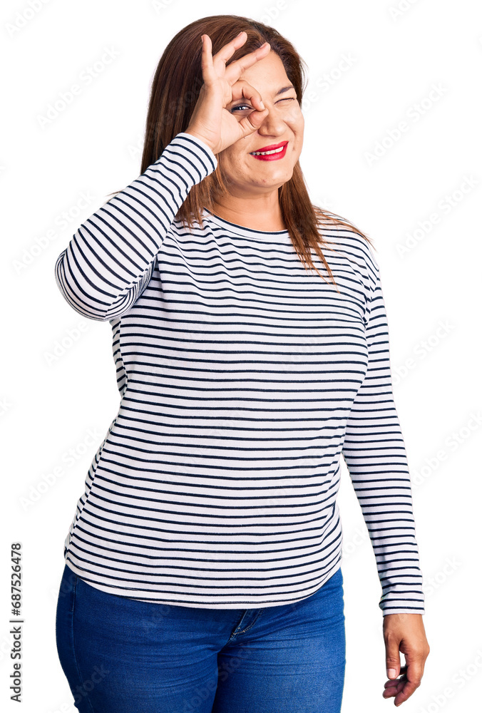 Middle age latin woman wearing casual clothes smiling happy doing ok sign with hand on eye looking through fingers Middle age latin woman wearing casual clothes smiling happy doing ok sign with hand on eye looking through fingers