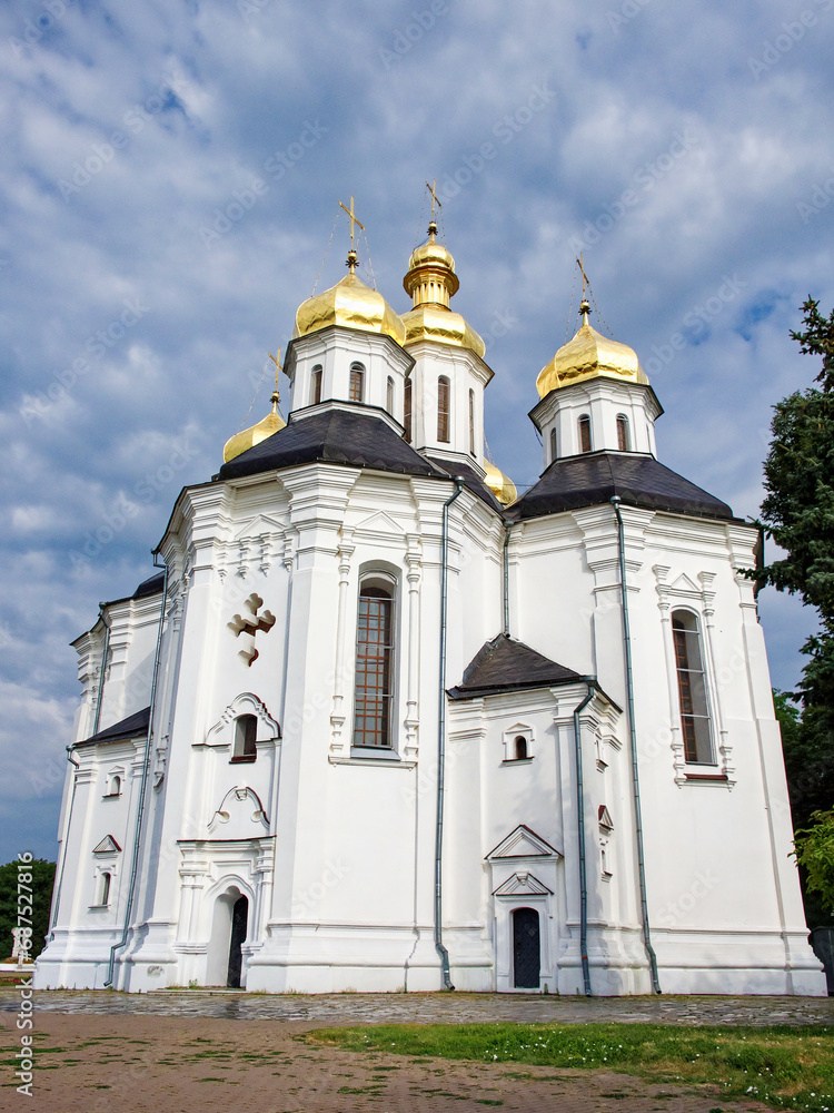 The Catherine's Church is beautifully exemplified in this scene, with its gleaming golden domes and pristine white exterior, embodying the quintessence of Ukrainian Baroque design.