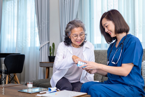 Obraz na płótnie Senior woman get medical service visit from caregiver nurse at home while explai