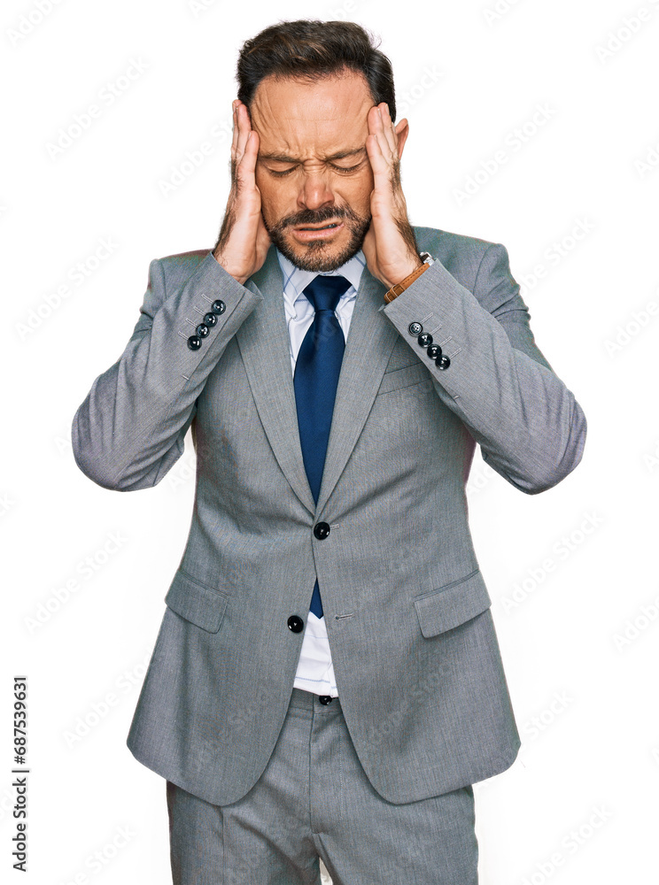 Middle age man wearing business clothes with hand on head, headache because stress. suffering migraine. Middle age man wearing business clothes with hand on head, headache because stress. suffering migraine.